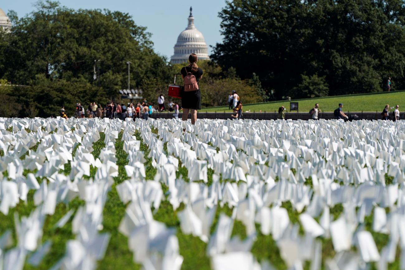 Thousands of white flags representing Americans who have died of COVID-19 are on view across 20 acres of the National Mall in Washington, DC, on September 26, 2021. 
