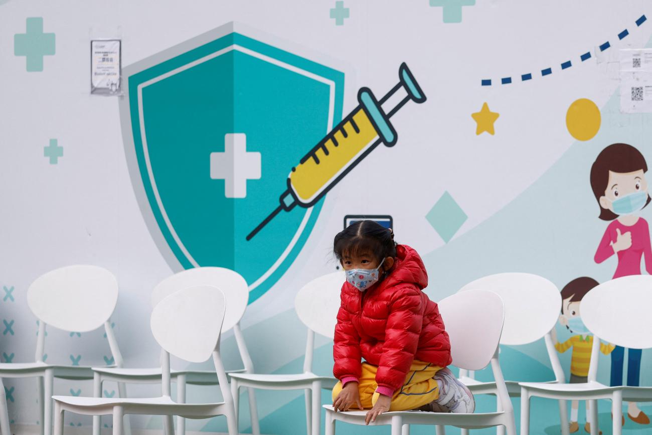 A child is seen at a community vaccination center, ahead of an expected border reopening with China, during the coronavirus disease (COVID-19) pandemic in Hong Kong, January 4, 2023.