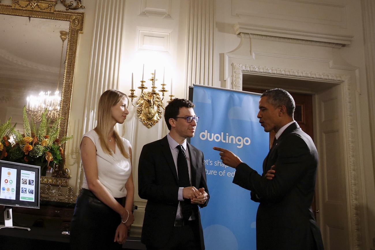 U.S. President Barack Obama (R) meets Luis von Ahn (2nd R) and Gina Gotthilf (3rd R) of Duolingo.