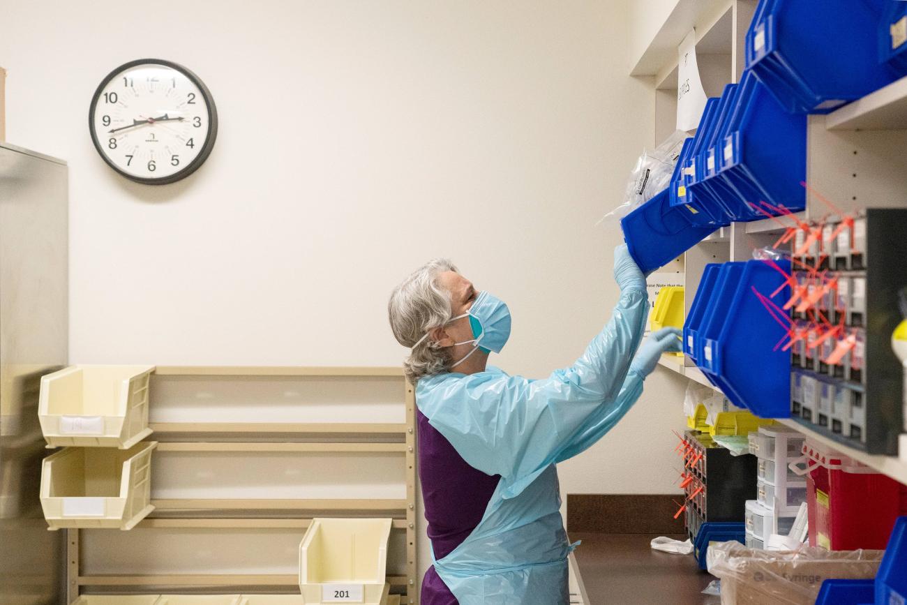 Respiratory therapist Annette James wears personal protective equipment as she prepares to see a patient at Medical Arts Hospital in Lamesa, Texas, United States, on December 17, 2020. 