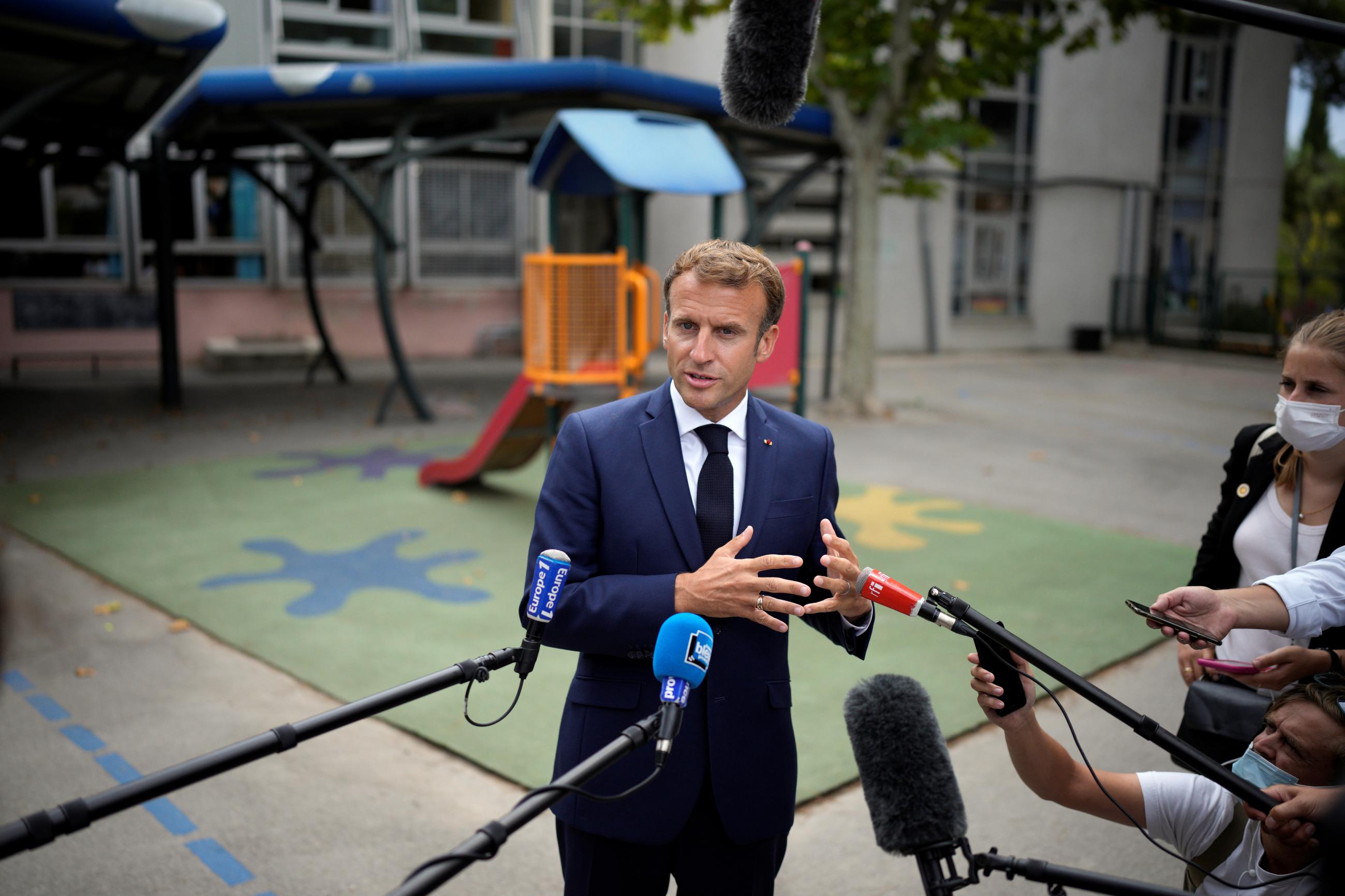 French President Emmanuel Macron speaks to the media during a visit at Bouge primary school in Malpasse district of Marseille, France, on September 2, 2021/