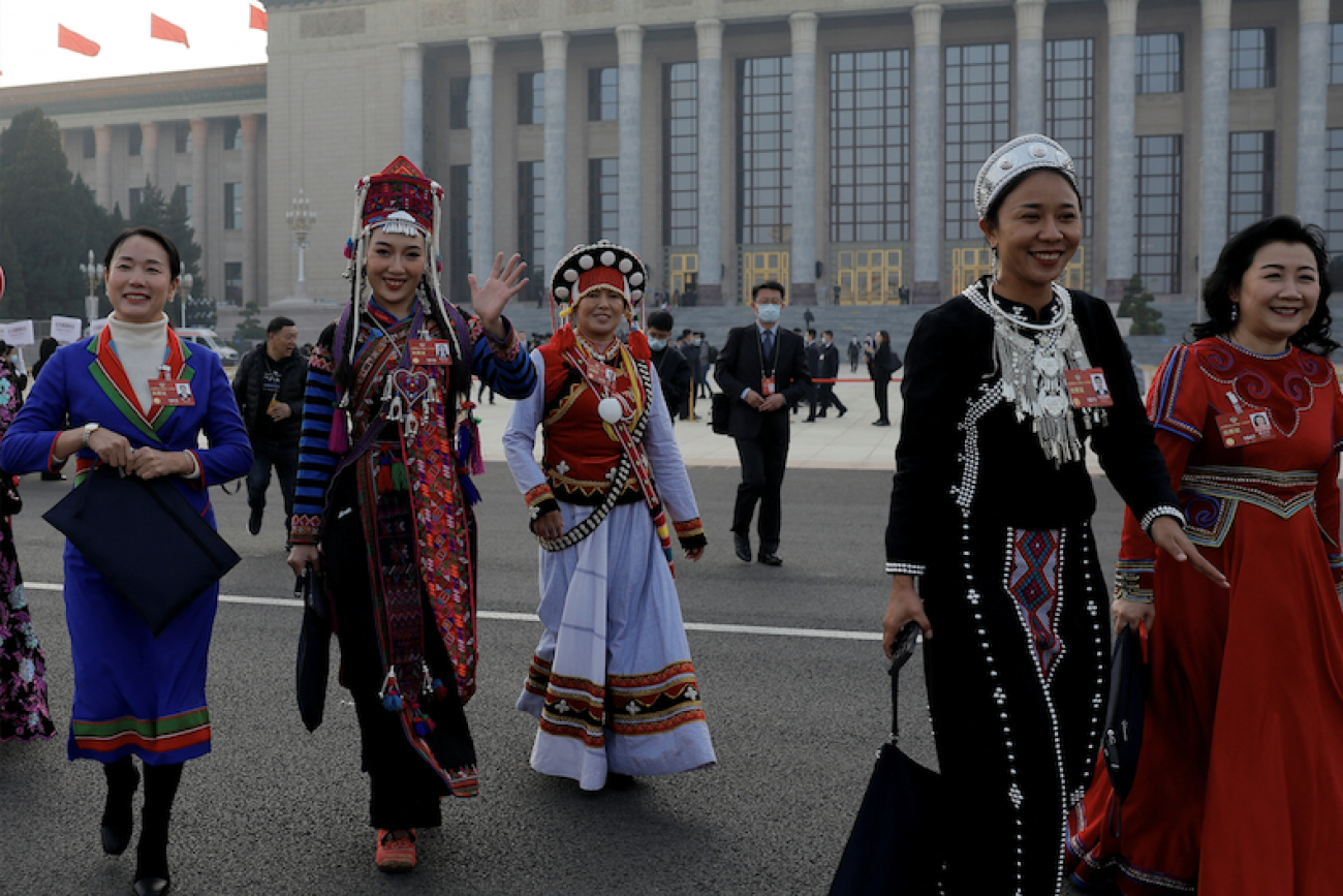 Women delegates in ethnic minority costumes leave the Great Hall of the People following the opening session of the Chinese People's Political Consultative Conference (CPPCC) in Beijing, China March 4, 2023. REUTERS/Thomas Peter