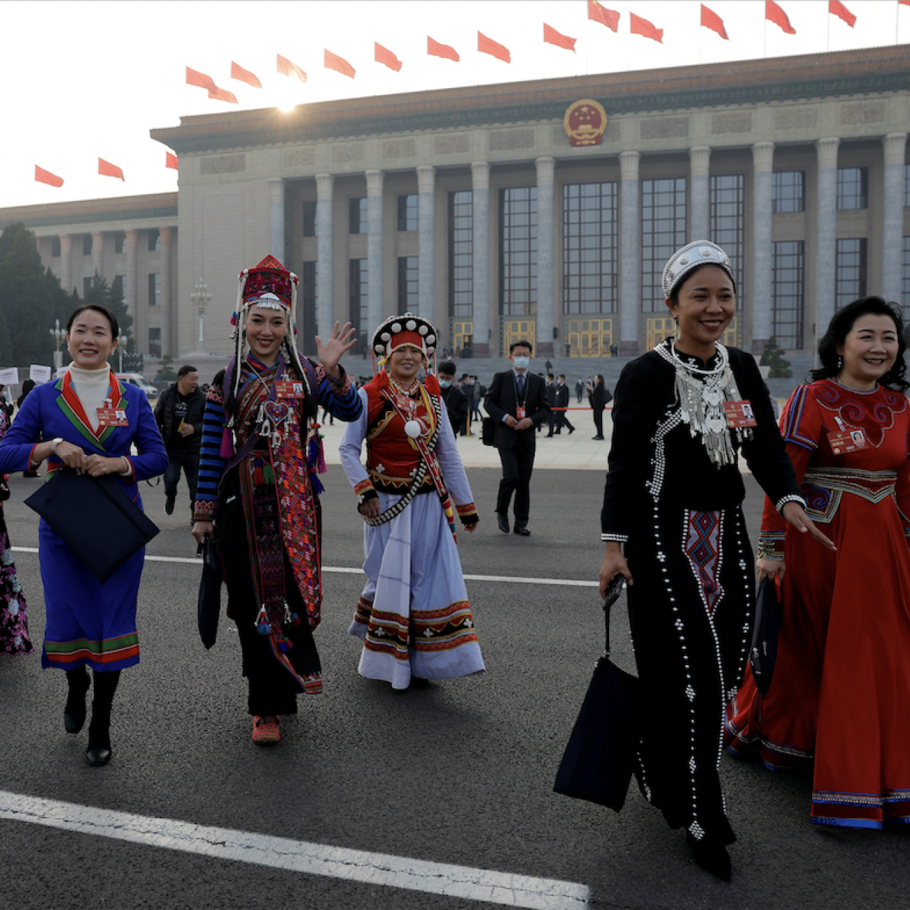 Women delegates in ethnic minority costumes leave the Great Hall of the People following the opening session of the Chinese People's Political Consultative Conference (CPPCC) in Beijing, China March 4, 2023. REUTERS/Thomas Peter